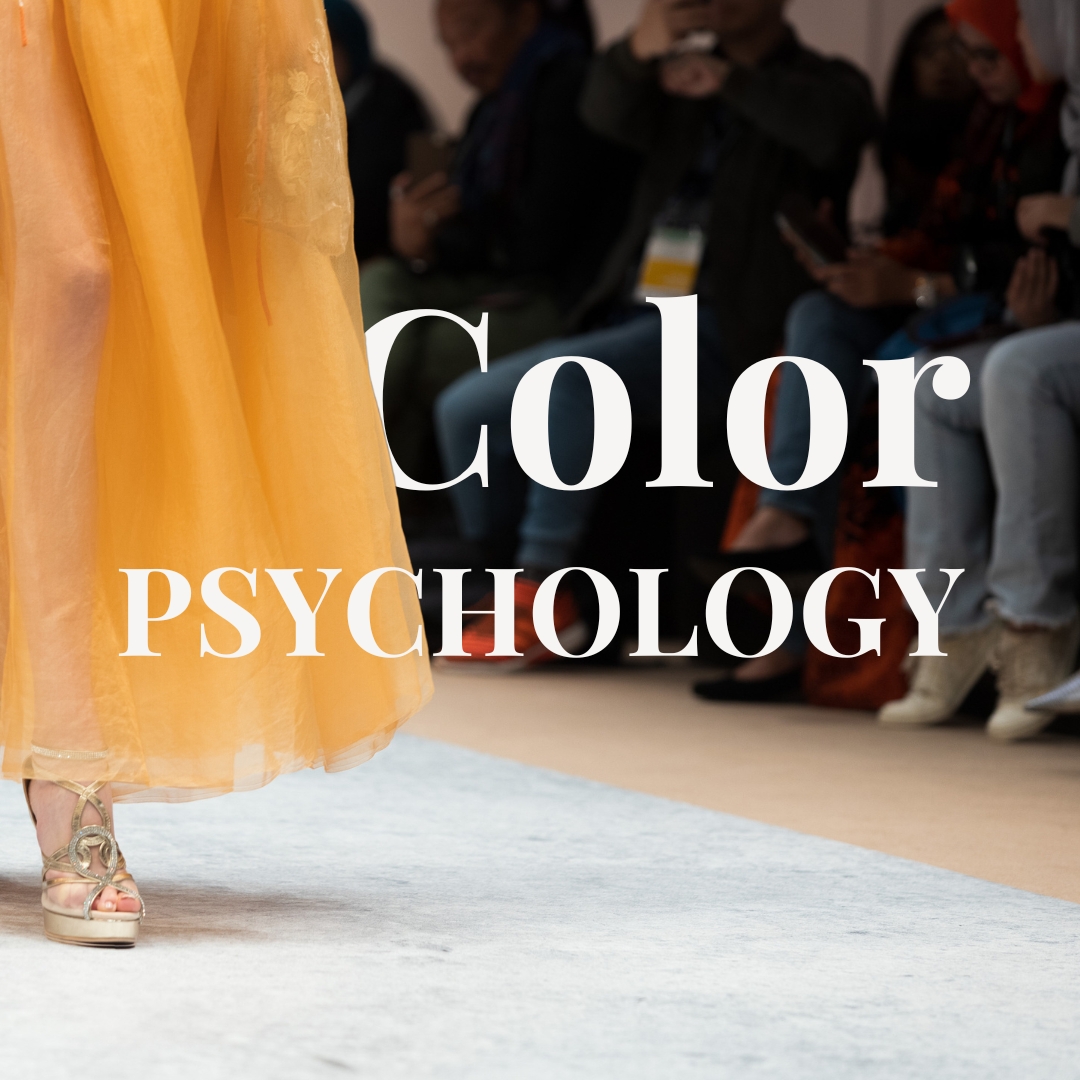 Model in a yellow dress walking down the runway with 'color psychology' text on the image.