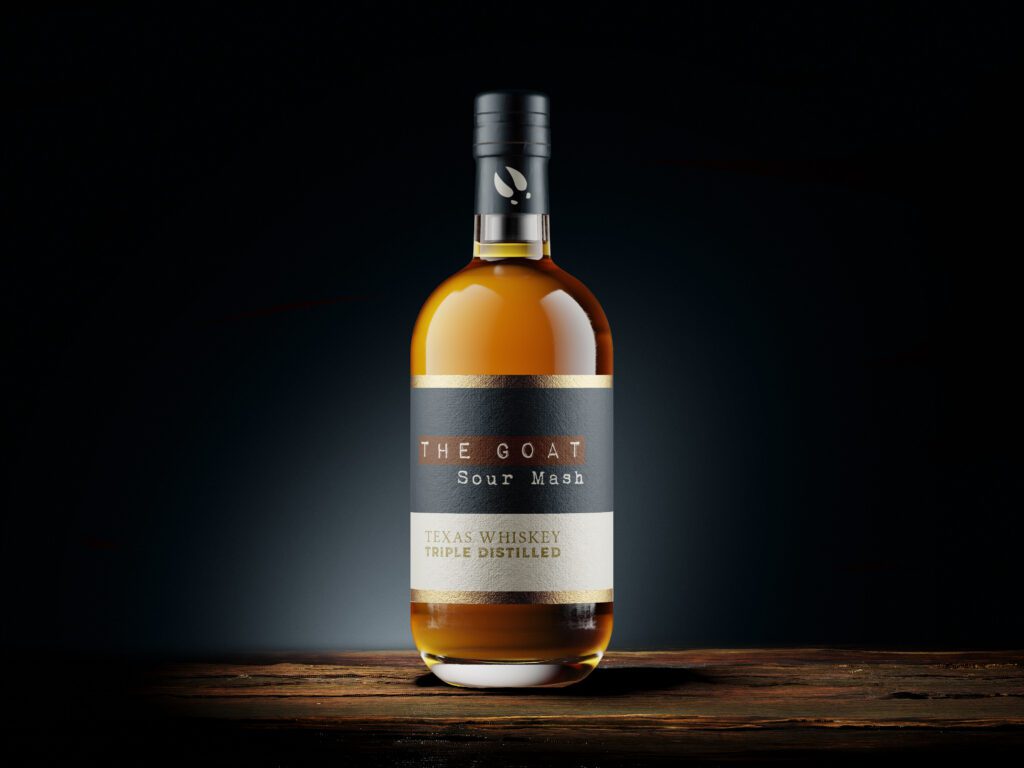 Elegantly branded The Goat Sour Mash whiskey bottle, representing the distilled essence of restaurant branding at Whiskey & the Goat.